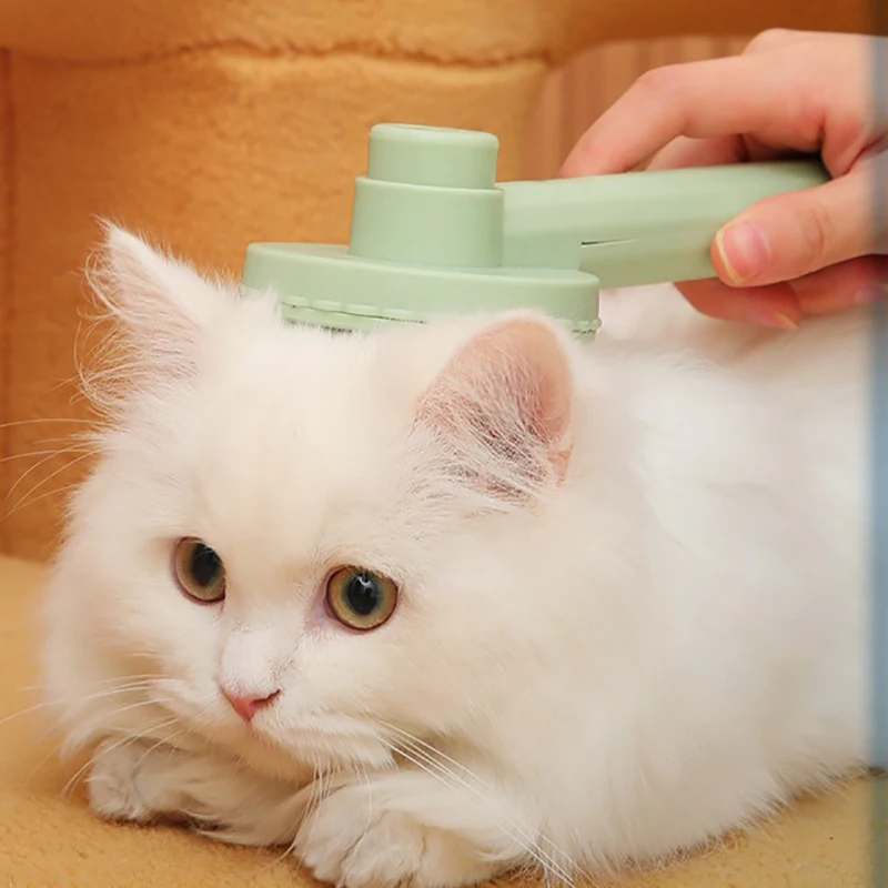 Escova para Cães e Gatos de Aço Inoxidável com Design Autolimpante - Image 2